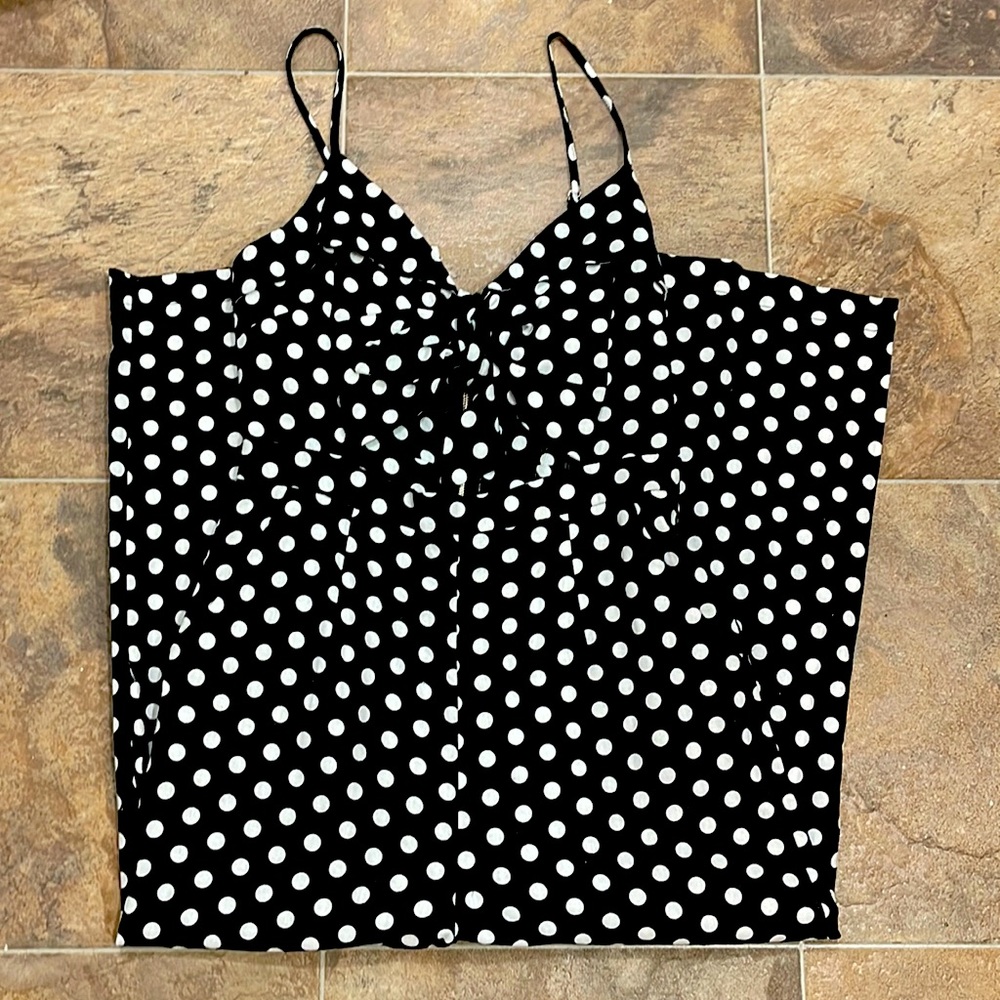 Adorable black and white polka dot jump suit.